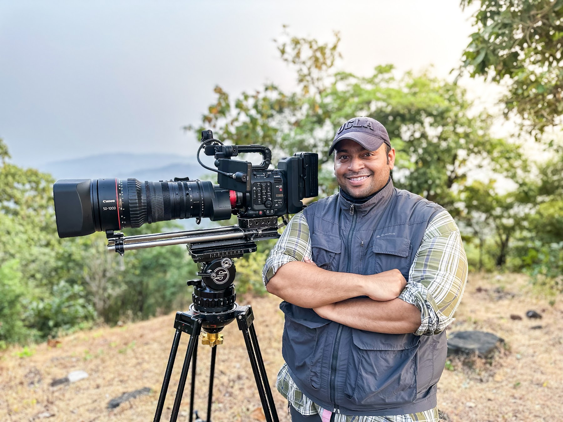 Kenneth Lawrence standing beside his cinema camera rig